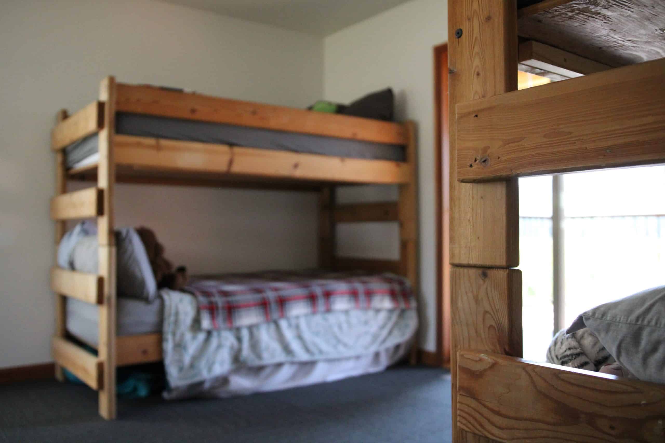 Bedroom of a teen mental health treatment program where teens get better sleep.