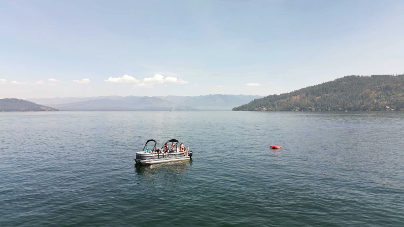 Turning Winds residents participating in experiential therapy on a lake near campus.